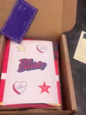 A customer unboxes GoBlo and lifts the pouch out of the box.